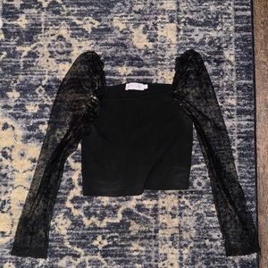 Sheer long sleeve black top